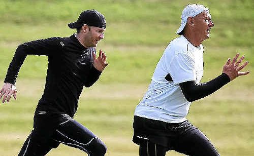 Michael Clarke in full sprint with personal trainer Duncan Kerr during his two week fitness camp in Coffs Harbour. Michael Clarke in full sprint with personal trainer Duncan Kerr during his two week fitness camp in Coffs Harbour.